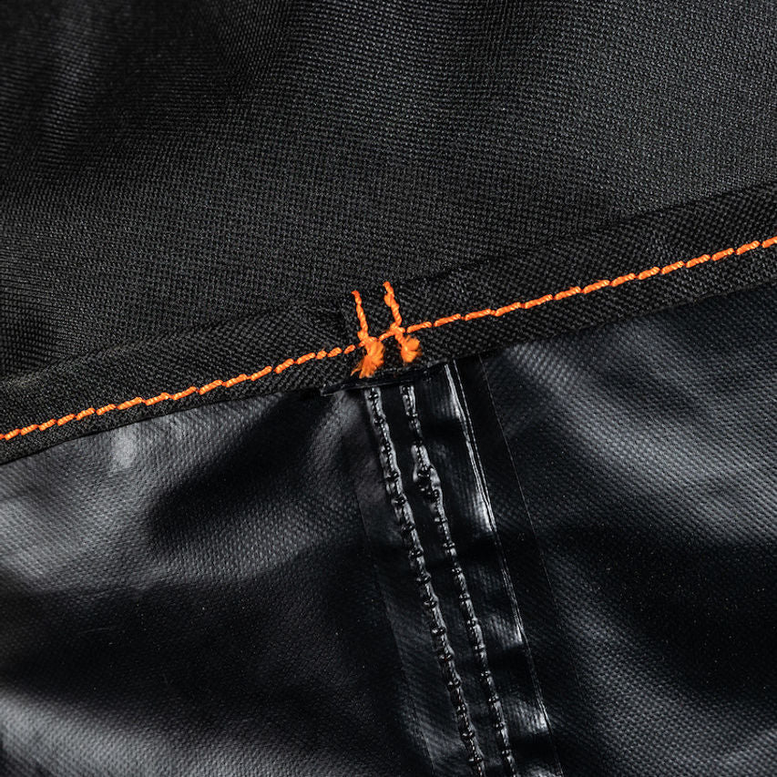 Close-up of the Firesmiths PK Series grill cover showing its durable waterproof inner lining, reinforced seams, and heavy-duty weather-resistant fabric for long-lasting outdoor protection.