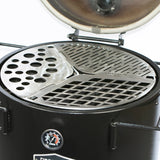 Close-up of the Firesmiths 3-in-1 stainless steel cooking grate system featuring interchangeable grill, searing, and vegetable cooking zones inside a Hero Smoker & Grill with the lid open.