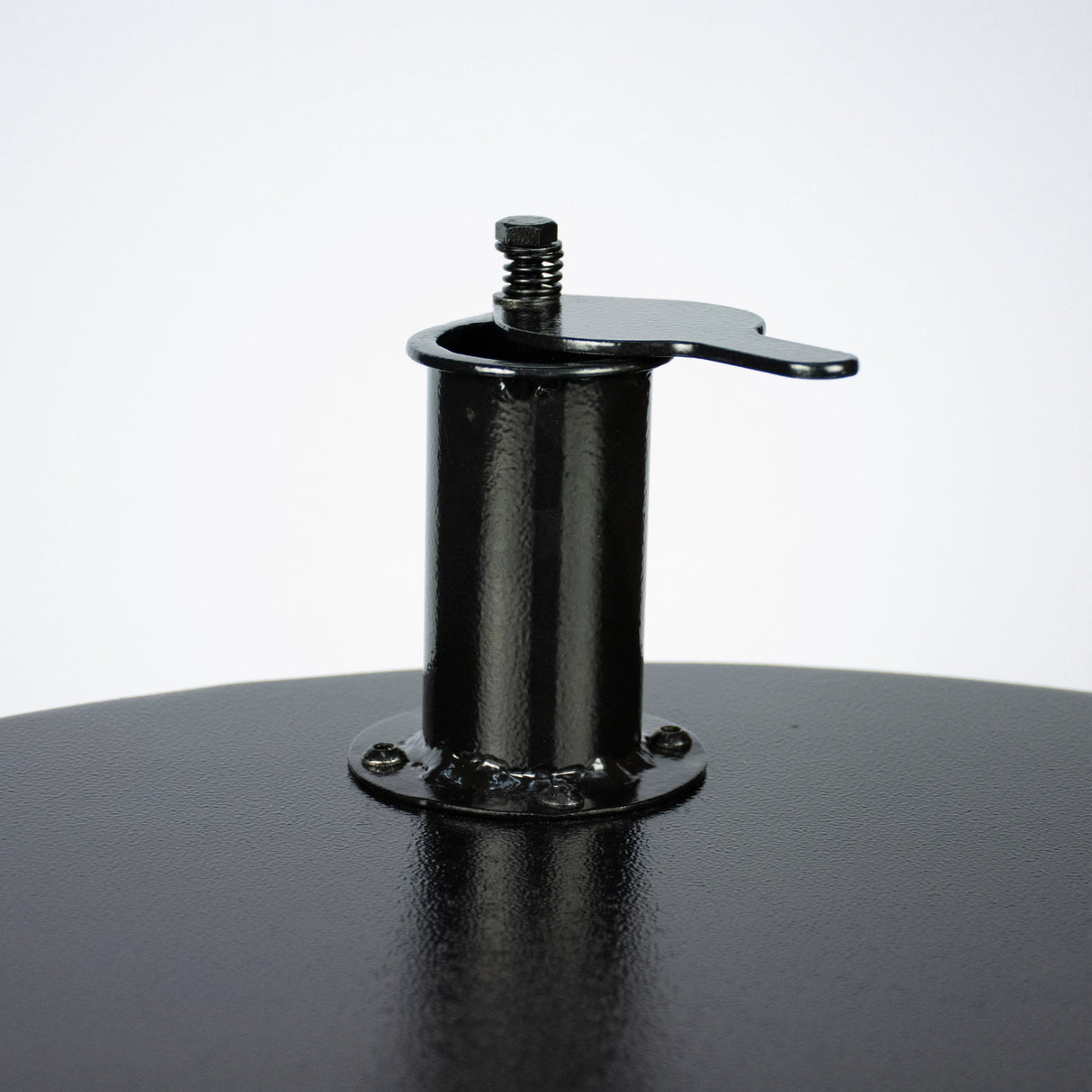 Close-up of the Firesmiths adjustable smoke vent and chimney damper on a Hero Smoker & Grill, allowing precise airflow control for consistent wood-fired smoking and grilling temperatures.