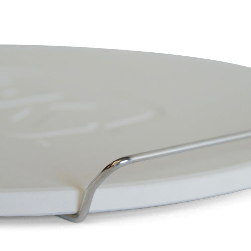 Close-up of the integrated stainless steel side carry handle on the Firesmiths cast iron braai lid, designed for safe lifting, easy transport, and secure handling.
