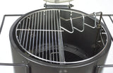 Firesmiths Hero Smoker & Grill with the lid open, featuring a stainless steel half cooking grate and integrated meat hanging hooks, allowing simultaneous grilling and wood-fired smoking in one versatile cooking system.