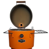 Firesmiths Hero Smoker & Grill in the Burnt Orange Edition with the lid open, featuring a stainless steel cooking grate, built-in temperature gauge, dual side shelves, and premium wood-fired grilling and smoking performance.