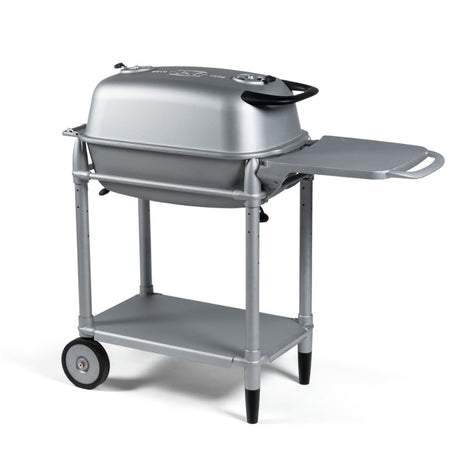 Firesmiths PK360 Silver charcoal grill with a premium rolling cart, integrated utility side shelf, lower storage shelf, cast aluminum body, and precision airflow controls for exceptional grilling and smoking performance.
