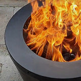 Close-up of a Firesmiths smokeless fire pit with bright wood-burning flames, showcasing efficient secondary combustion, powerful heat output, and a clean-burning outdoor fire experience.